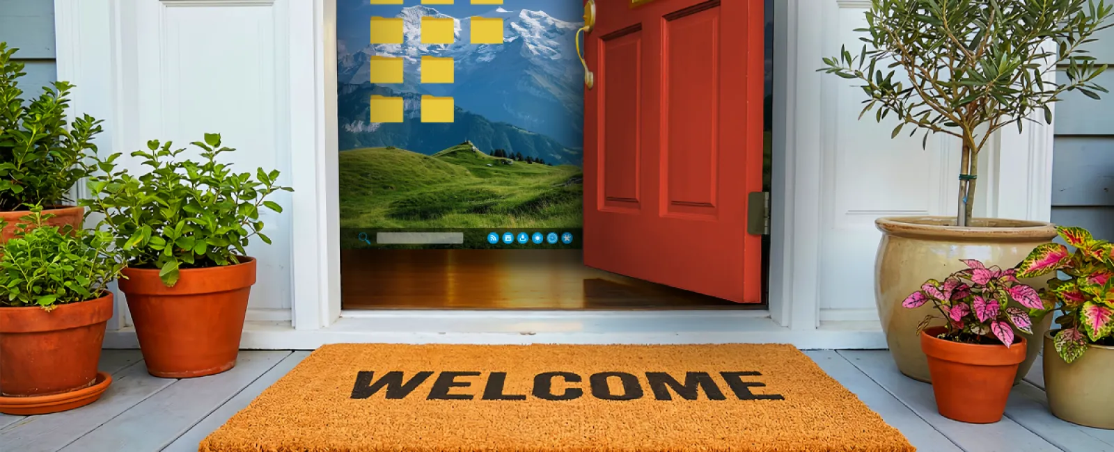 Open red door with a welcome mat and potted plants revealing a computer desktop screen with mountain wallpaper inside.